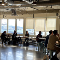 View of participants watching the presentation.